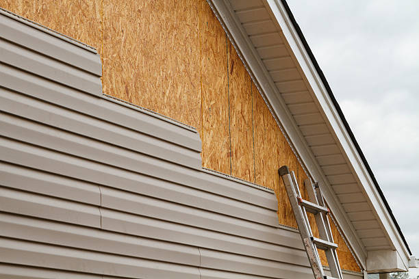 Professional Siding Installation technician working in Fletcher, OH